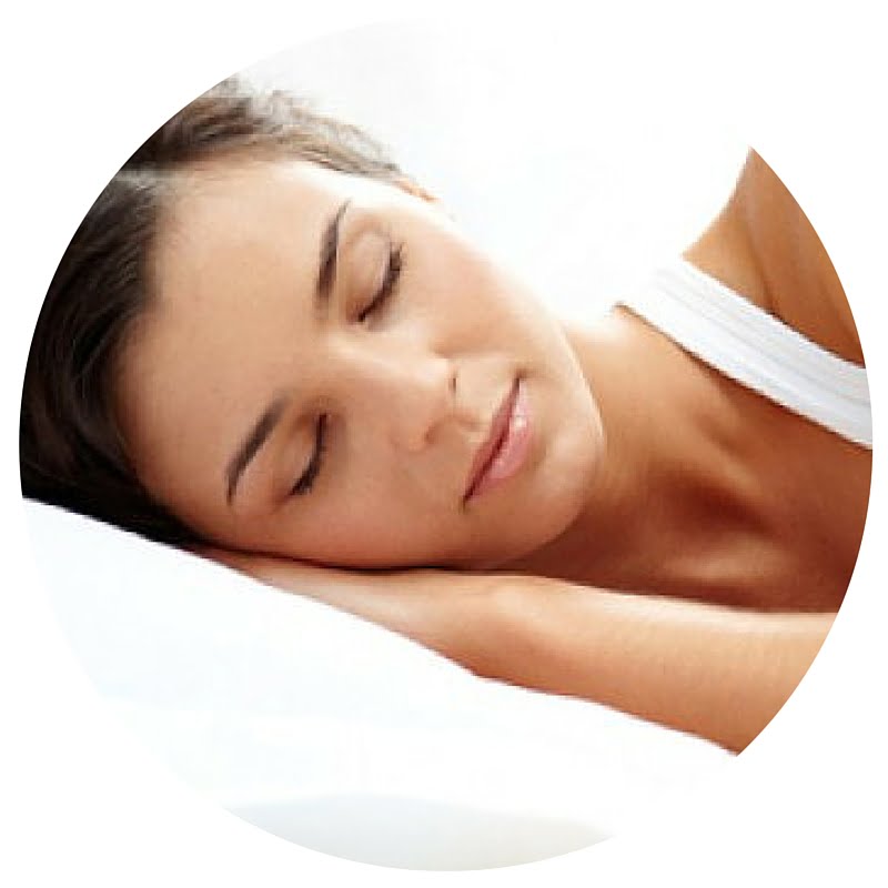 A person sleeping peacefully on a white pillow, resembling the calm after visiting an orthodontist, wearing a white tank top.