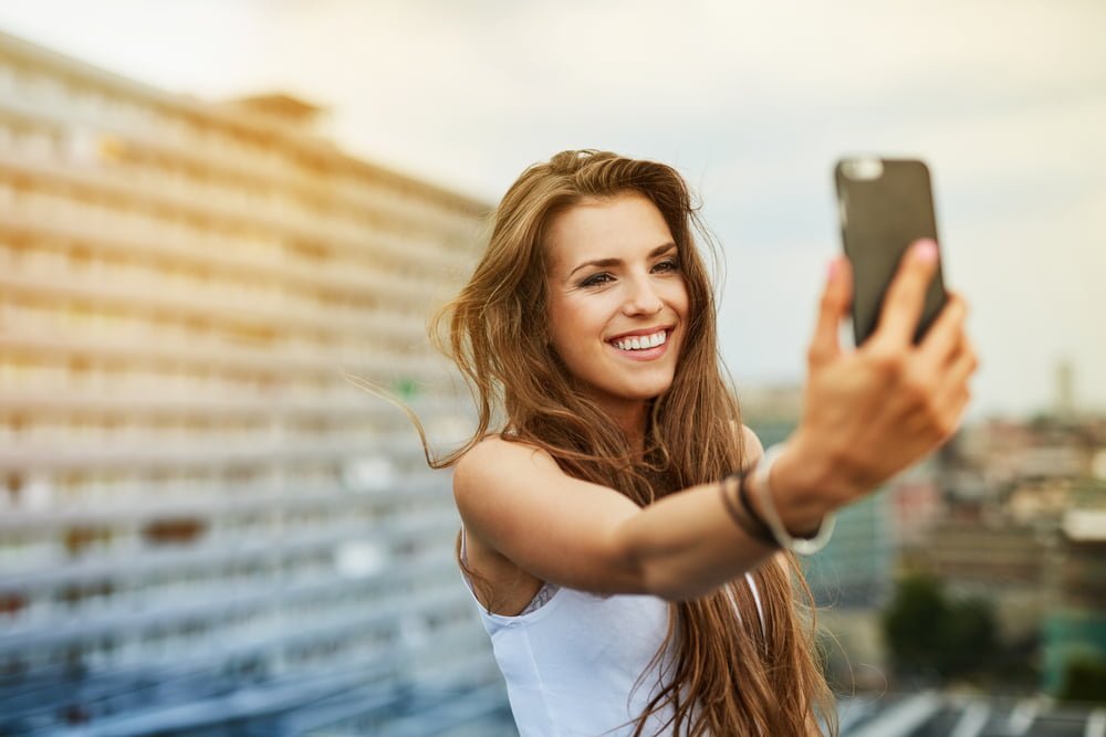 Woman Taking Selfie with Straight Smile